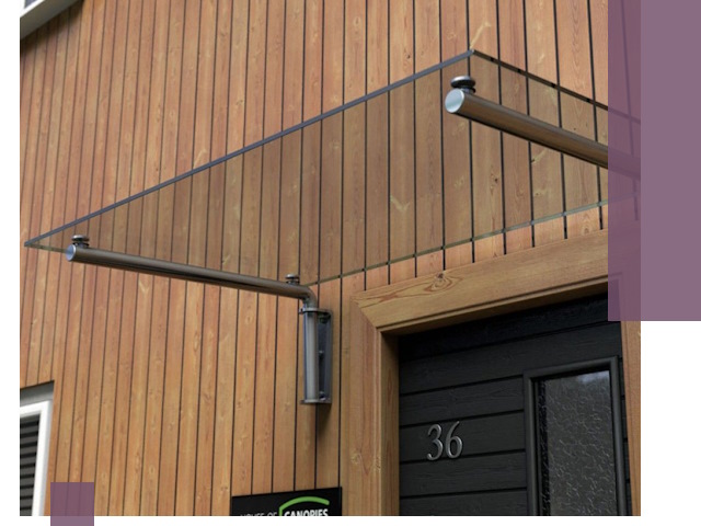 Стеклянные козырьки на входы и фасады в Сестрорецке